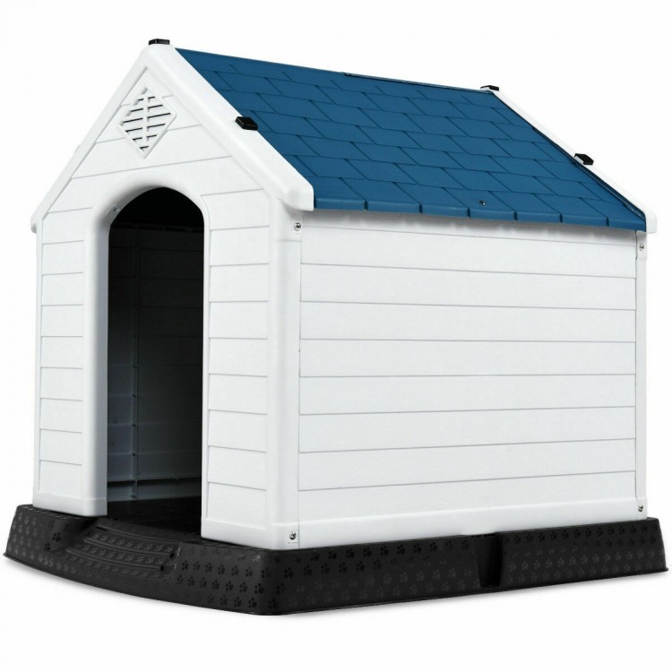 Durable plastic dog house with a blue roof, providing waterproof shelter for pets in all weather conditions.