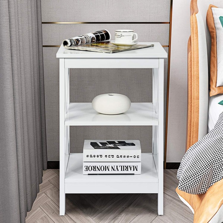 White nightstand with X-design, showcasing a smooth surface and two open shelves, ideal for stylish bedroom or living.