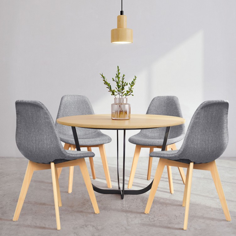 Modern dining chair set with wood legs and fabric cushions, featuring ergonomic design for comfort in any dining space.