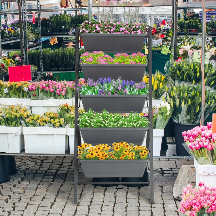 5-tier raised garden bed in gray with vibrant flowers, perfect for growing vegetables and herbs with excellent drainage.