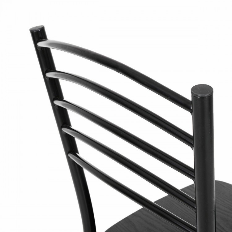Close-up of the black metal chair backrest with horizontal bars, part of a 5-piece wood dining table set for comfort.