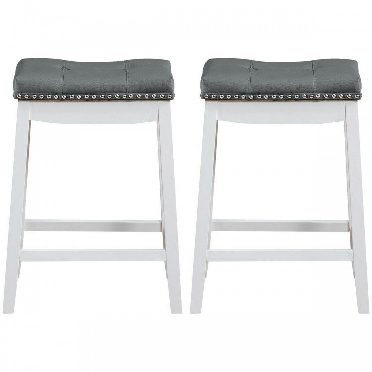 Set of 2 nailhead saddle bar stools with soft upholstery and rubber wood legs, ideal for kitchen or bar use.