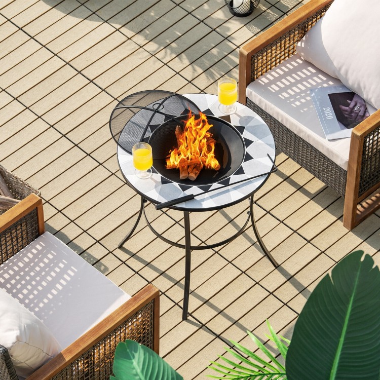 Round fire pit table with mesh cover, featuring a durable steel frame, ideal for outdoor gatherings on the patio.