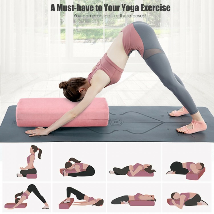 Yoga bolster pillow in pink with a soft suede cover, perfect for supporting various yoga poses at home or on the go.