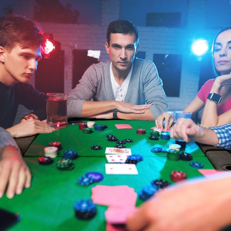 Foldable green poker table for 8 players with cup holders and padded armrests, perfect for game nights and gatherings.
