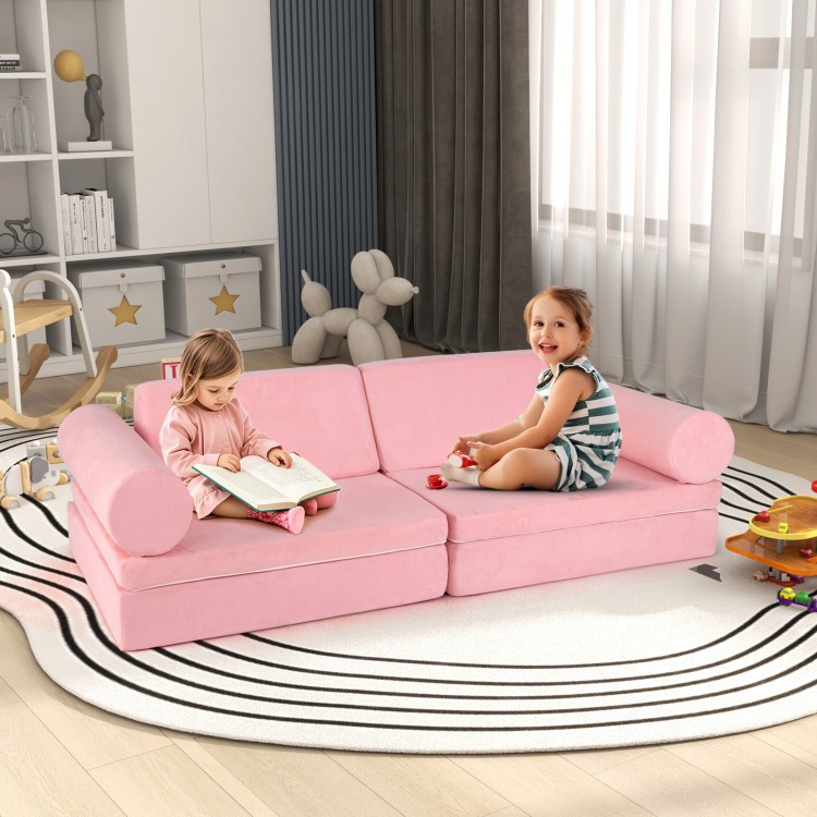 Modular 8-piece kids play couch in pink with suede cover, ideal for imaginative play and comfortable lounging.
