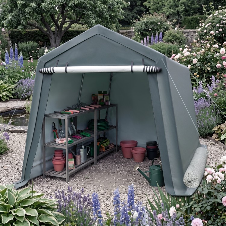 Spacious outdoor storage shed with a roll-up zipper door, featuring a sturdy metal frame for secure garden tool storage.