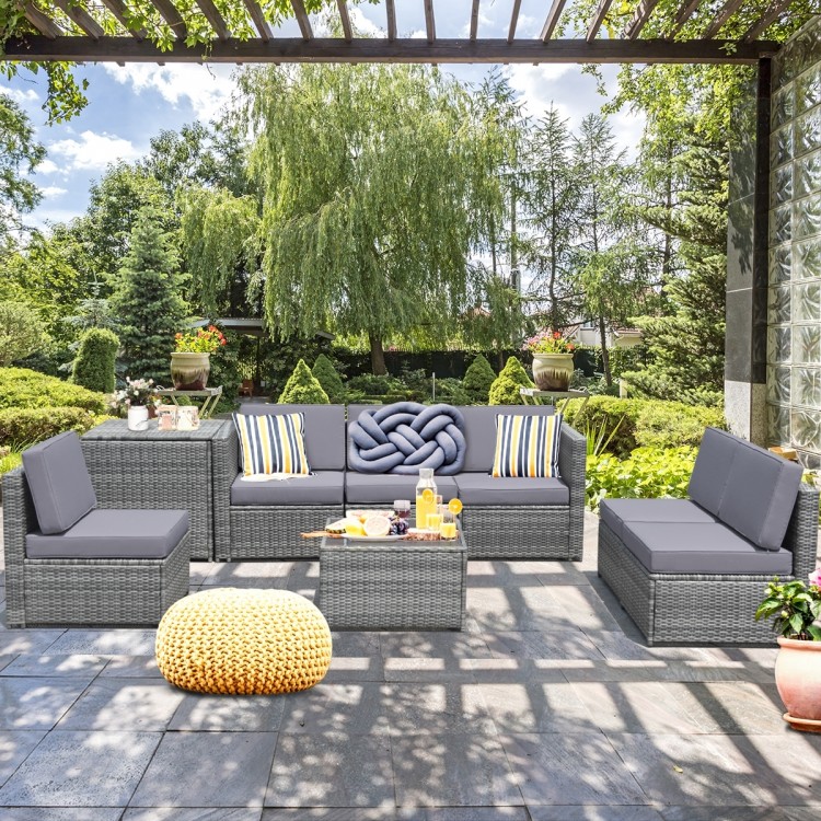 8-piece gray wicker sofa set with cushions and storage table, perfect for outdoor patio relaxation and gatherings.