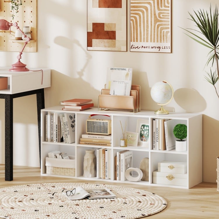 8-cube white bookshelf with decorative items, showcasing organized storage for living rooms and studies.