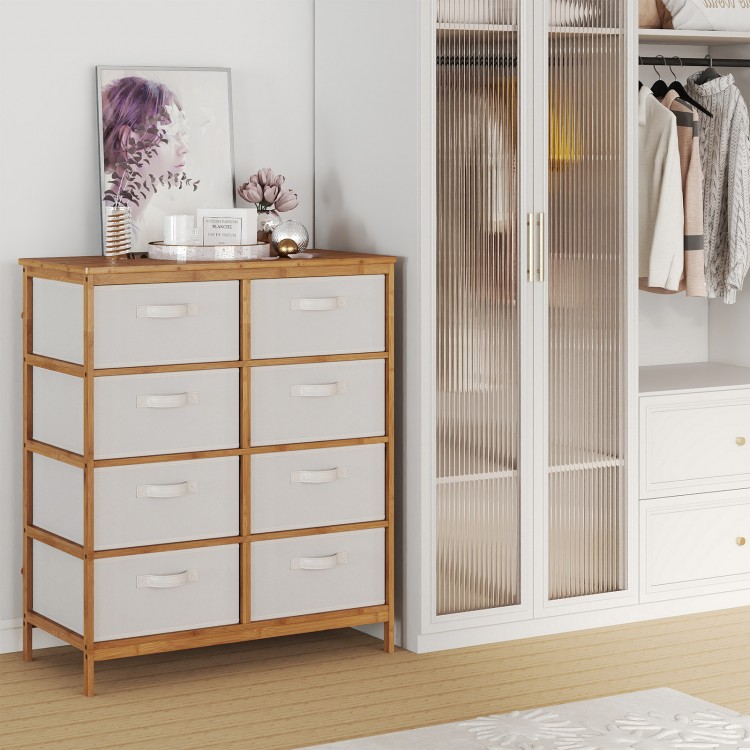 Close-up view of beige removable fabric bins in an 8-drawer dresser with a sturdy bamboo frame, designed for stylish.