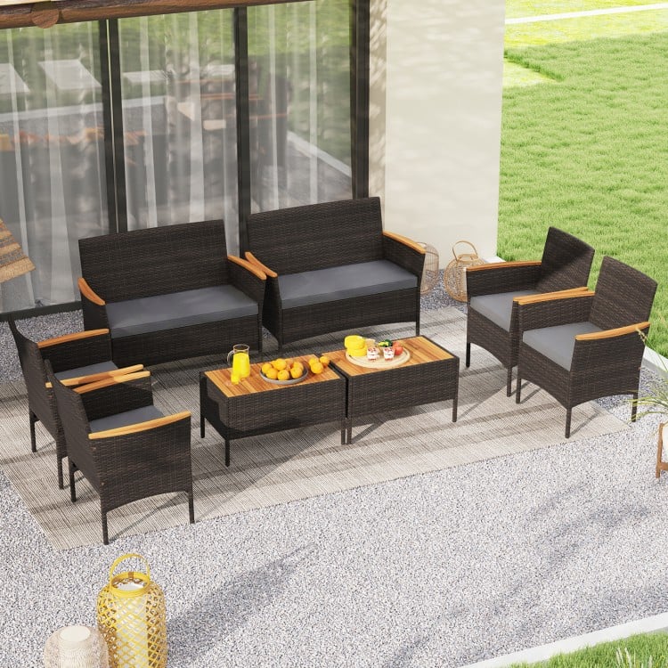 8-piece patio wicker sofa set featuring 4 rattan chairs and 2 loveseats with acacia wood armrests, perfect for outdoor.