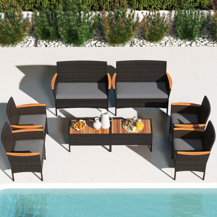 8-piece patio wicker sofa set featuring 4 rattan chairs and 2 loveseats with acacia wood armrests, ideal for outdoor.