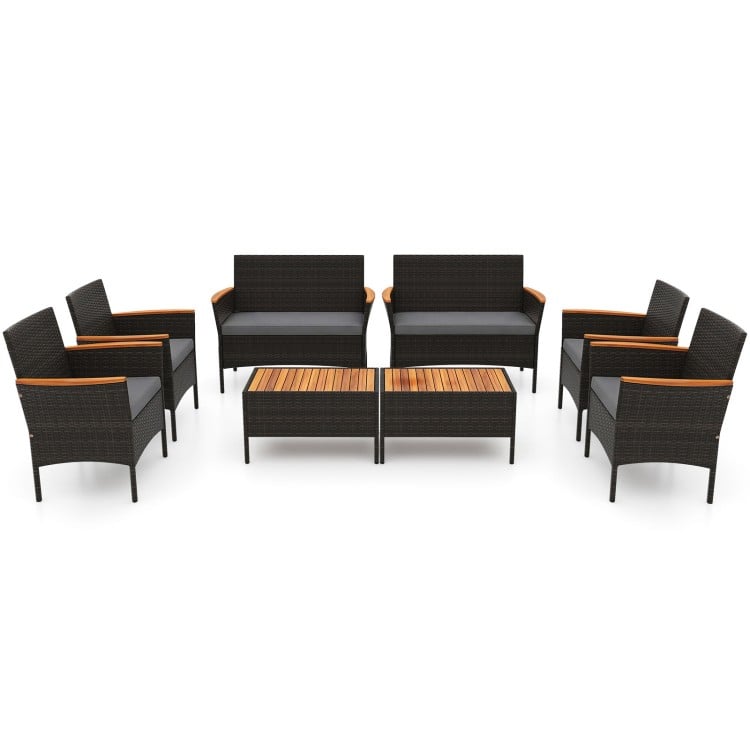 Full view of the 8 Piece Patio Wicker Sofa Set with 4 rattan chairs and 2 loveseats, featuring elegant acacia wood.