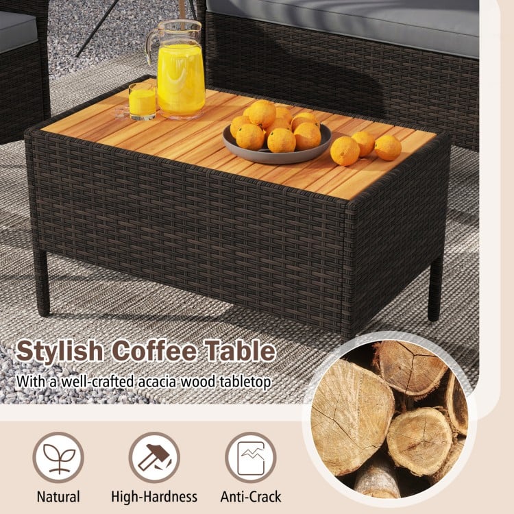 Stylish coffee table with acacia wood tabletop and PE rattan base, perfect for outdoor patio use.