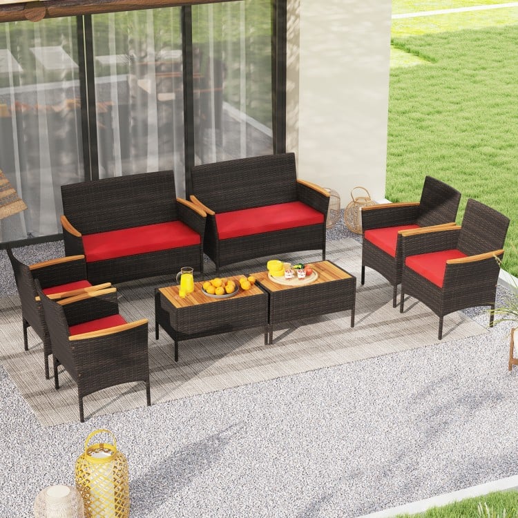 Full view of the 8 Piece Patio Wicker Sofa Set with red cushions, perfect for stylish outdoor gatherings and relaxation.