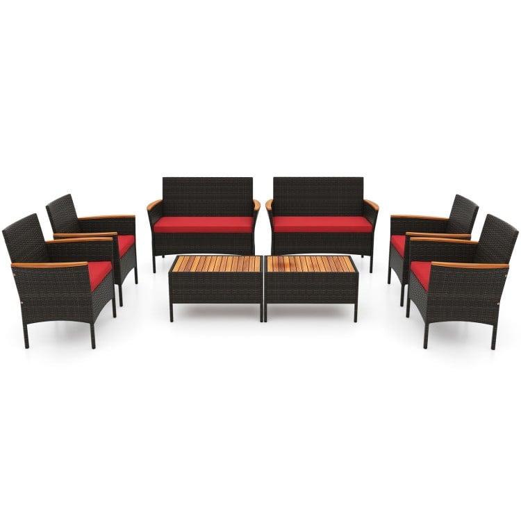 8-piece patio wicker sofa set featuring 4 rattan chairs and 2 loveseats with red cushions and acacia wood accents.