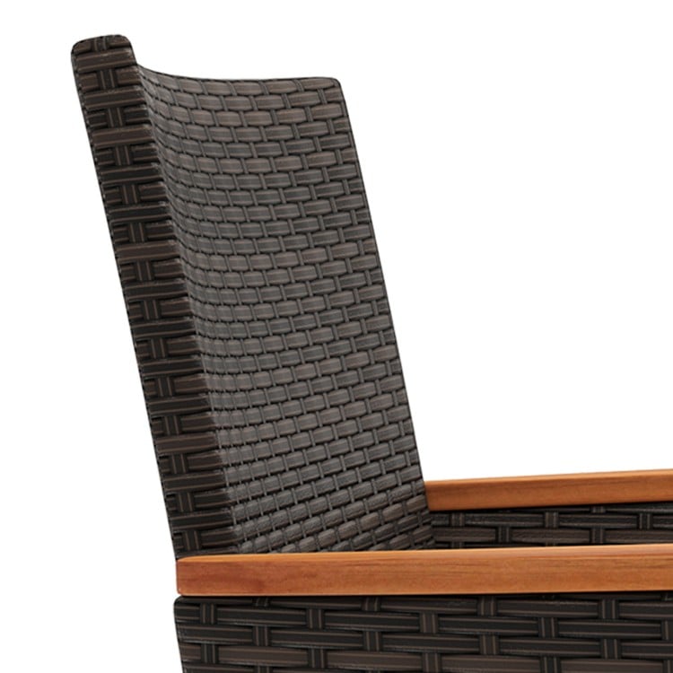 Close-up of the acacia wood armrest and premium hand-woven PE rattan of a patio chair for outdoor comfort.
