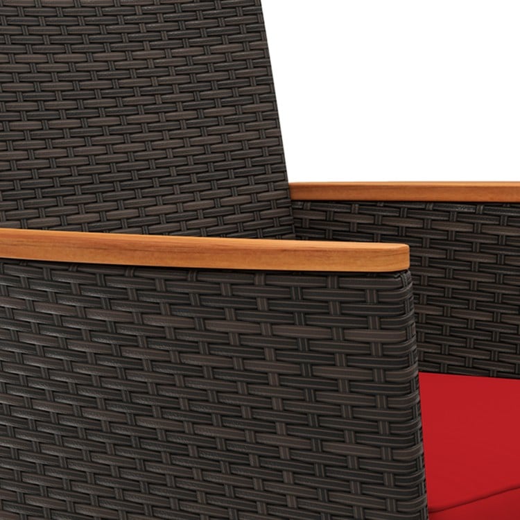 Close-up of the armrest of a patio chair featuring hand-woven PE rattan and acacia wood for elegant outdoor seating.