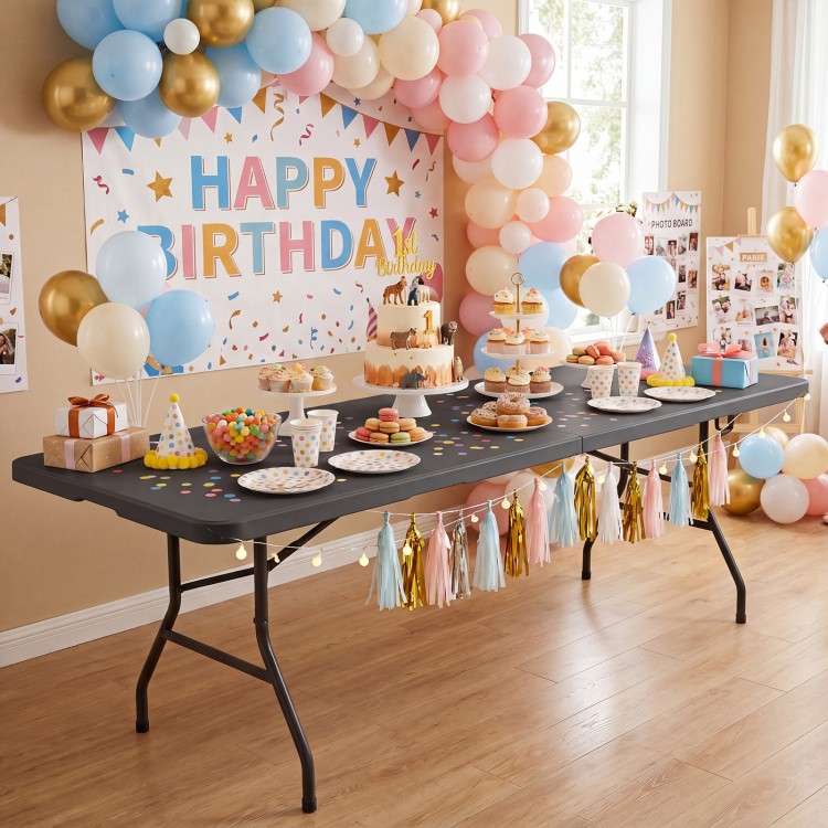 The 8 ft portable folding table features a black HDPE tabletop, ideal for birthday parties and outdoor gatherings.