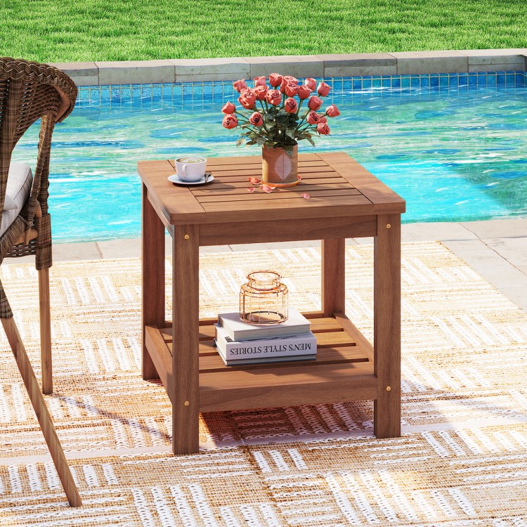 2-tier outdoor side table made of solid wood with storage shelf, ideal for patio use and featuring a slatted tabletop.