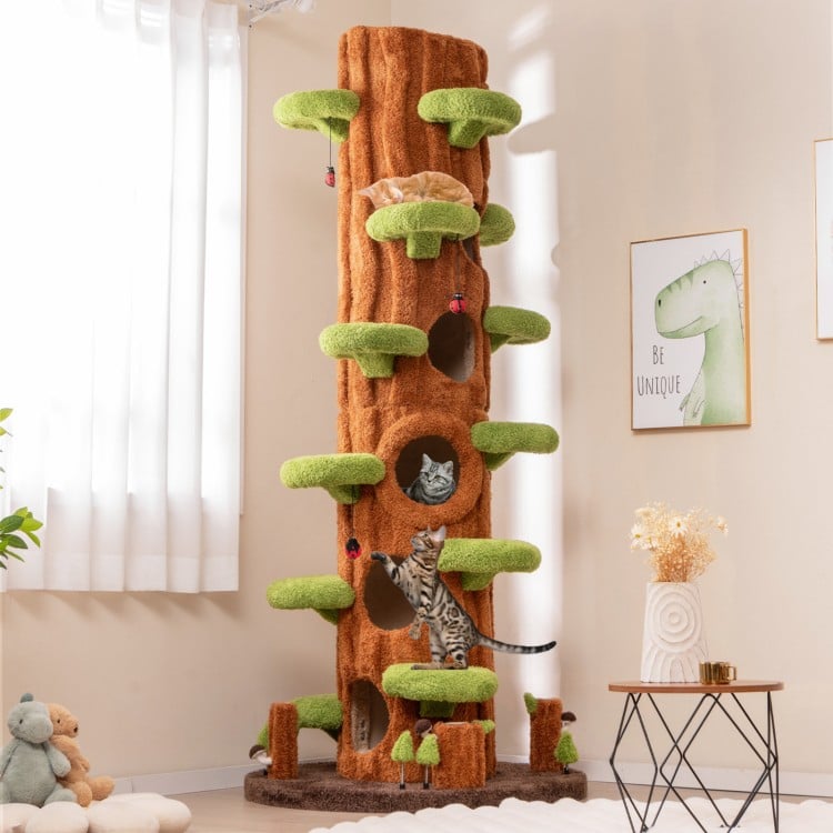 Tall multifunctional cat tree with private condos, sisal scratching panels, and plush cushions for indoor cats.