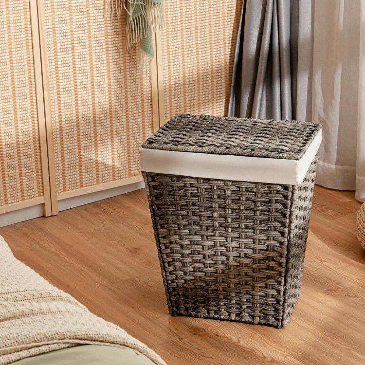 Handwoven gray laundry hamper with removable liner, flip lid, and foldable design for easy storage in any room.