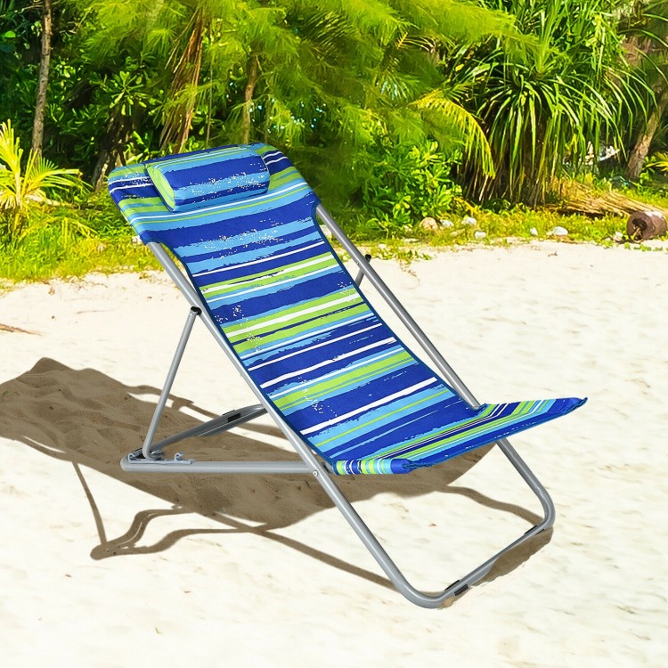 Portable blue beach chair with adjustable backrest and headrest, perfect for outdoor relaxation and easy to fold.