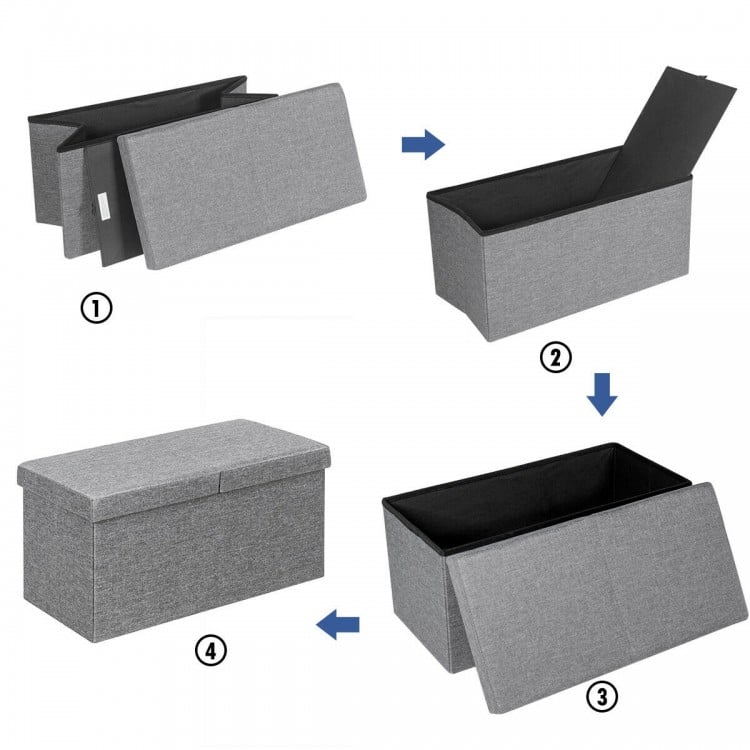 Folding storage ottoman in light gray with a lift top, showcasing spacious interior for organizing clothes and blankets.