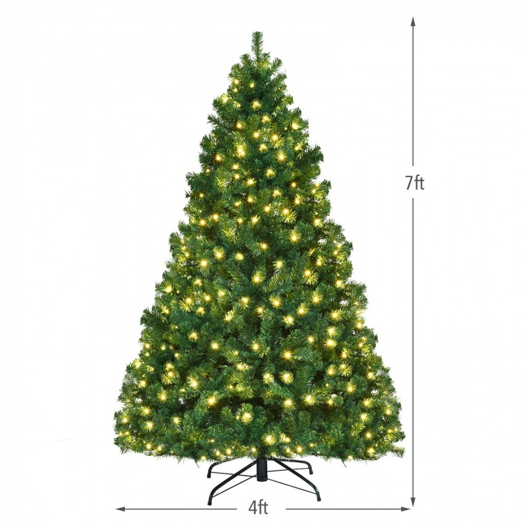 7-foot PVC artificial Christmas tree with pre-lit LED lights, featuring hinged branches for easy setup and a sturdy.