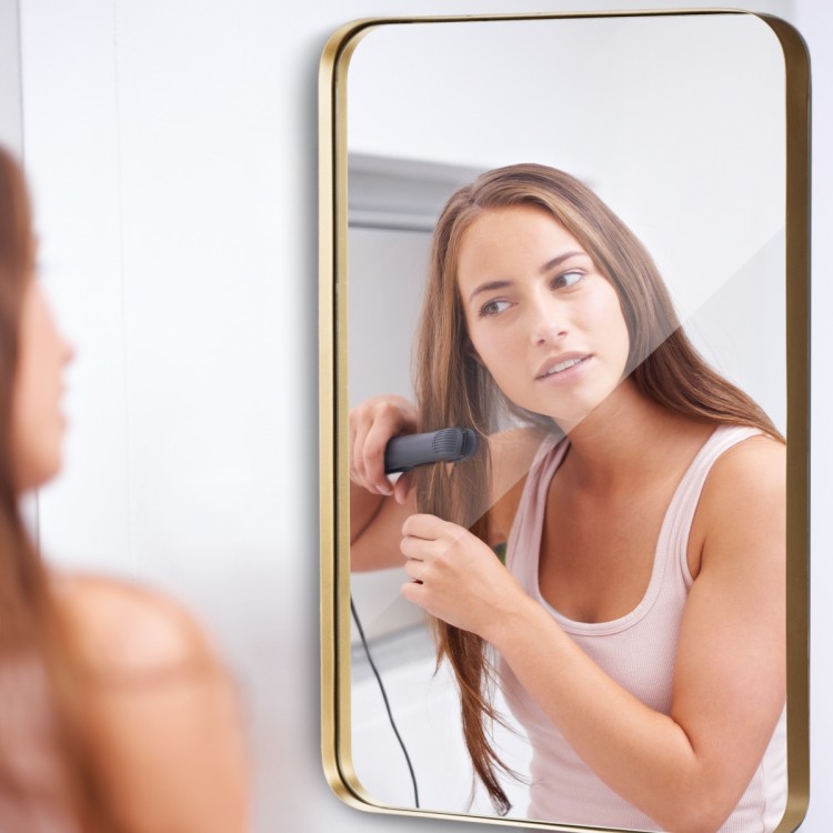 Rectangular 32x20 inch wall-mounted mirror with a gold metal frame, ideal for bathrooms or living rooms.