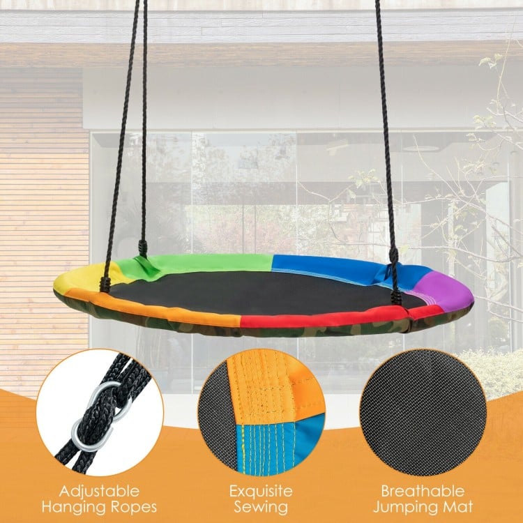Colorful saucer tree swing with adjustable ropes and breathable mat, perfect for outdoor fun and comfort for kids.