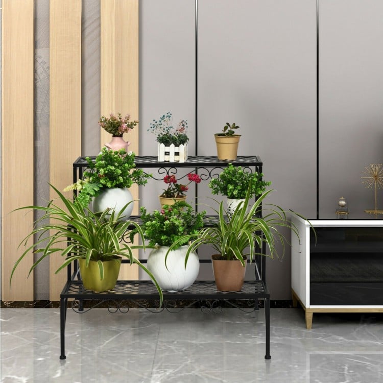Three-tier metal decorative plant stand with elegant design, featuring space for various plants, suitable for indoor.