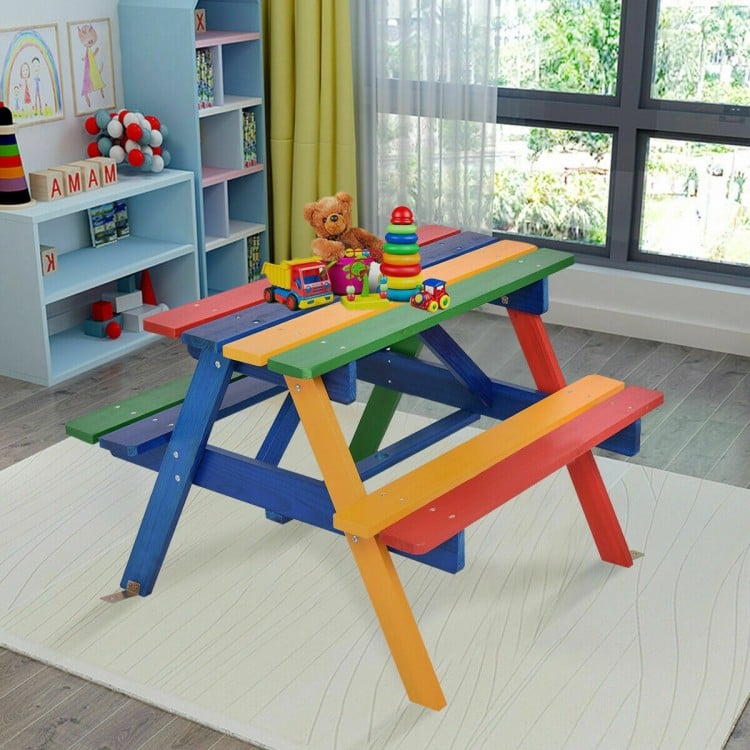 Colorful 4-seat kids picnic table made of eco-friendly fir wood, perfect for outdoor meals and playtime with umbrella.