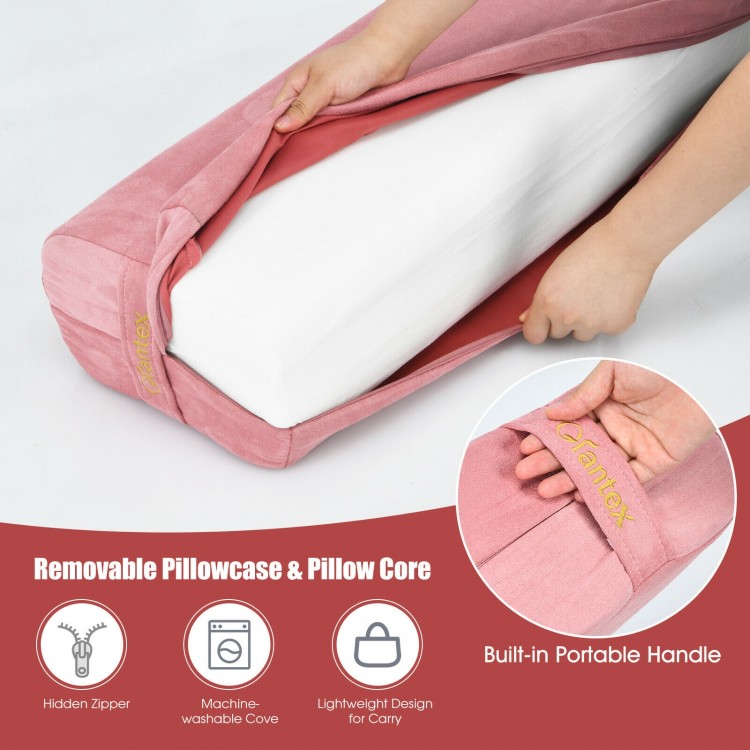 Yoga bolster pillow in pink with removable cover, built-in handle, and soft suede surface for comfort and portability.