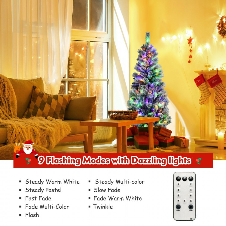 Hinged 5 feet pre-lit Christmas tree with snow flocked branches and 140 LED lights, ideal for easy setup and festive.