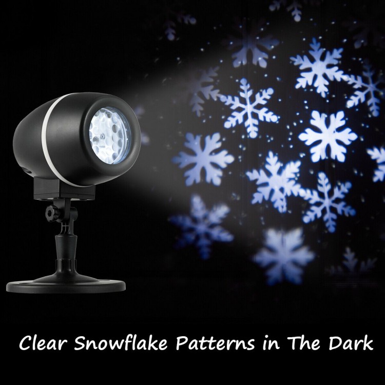 Snowflake LED projector light with remote control, creating realistic snow scenes for outdoor Christmas displays.