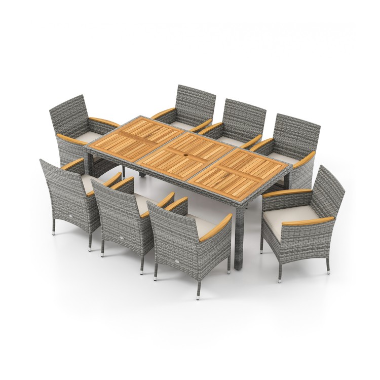 9-piece patio dining set featuring PE wicker chairs and solid acacia wood table, perfect for outdoor dining and.
