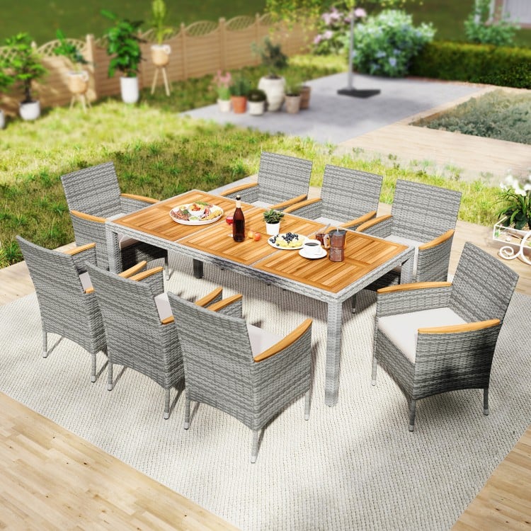 9-piece patio dining set featuring PE wicker chairs and acacia wood table, perfect for outdoor dining in gardens or.