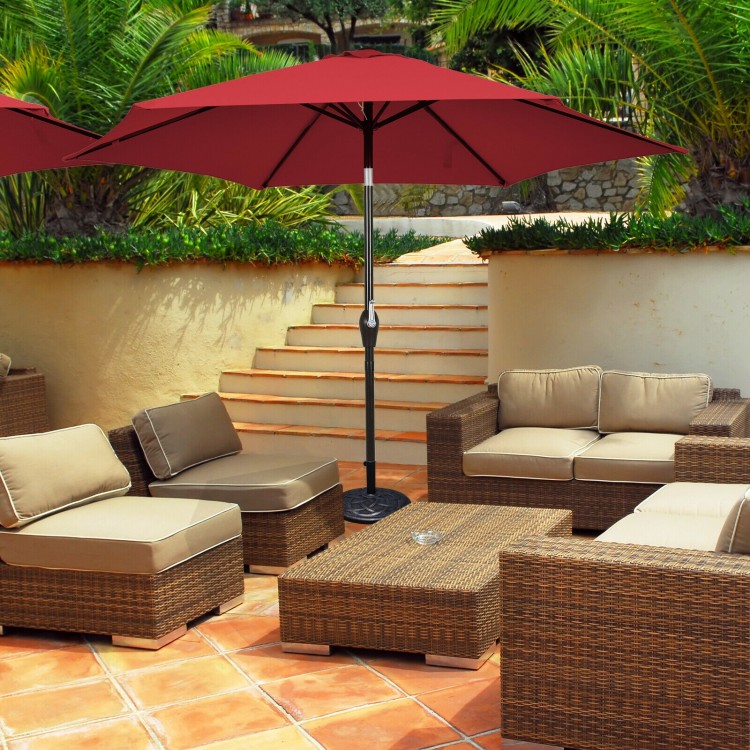 Burgundy 9 ft outdoor patio umbrella with push-button tilt and crank lift, ideal for sun protection in outdoor settings.