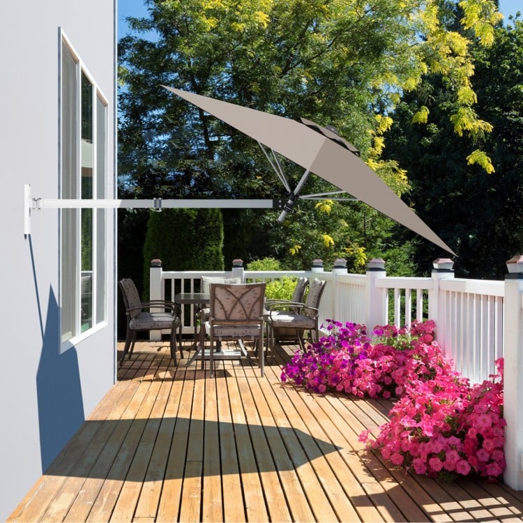 Wall-mounted 8ft telescopic folding umbrella in tan, featuring a durable aluminum frame for effective sun protection on.