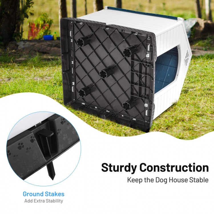 Sturdy plastic dog house with waterproof roof and ground stakes for stability, perfect for outdoor use and easy.