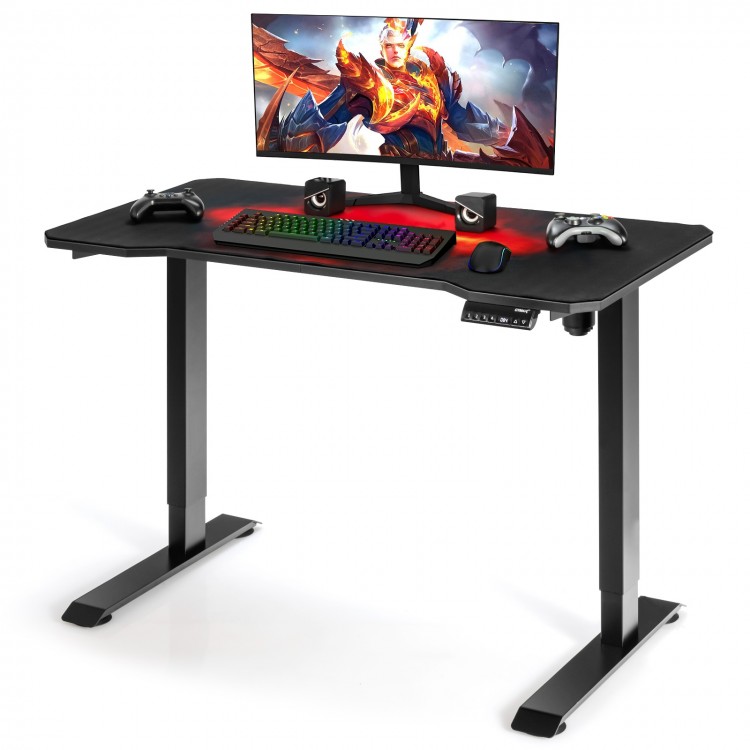 Electric standing gaming desk with height adjustable splice board, featuring a carbon fiber texture and digital height.