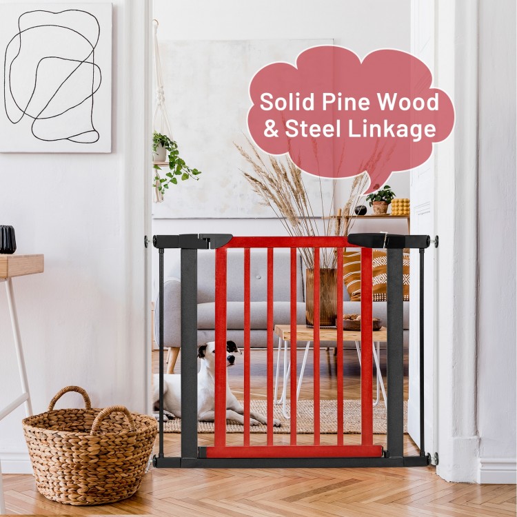 Extendable safety gate in red, made of solid pine wood and metal, designed for child and pet safety in doorways.