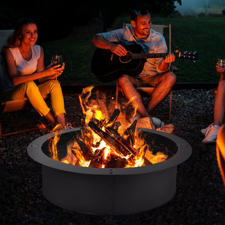 Round 36-inch steel fire pit ring with a powder-coat finish, perfect for DIY outdoor use and creating a warm atmosphere.