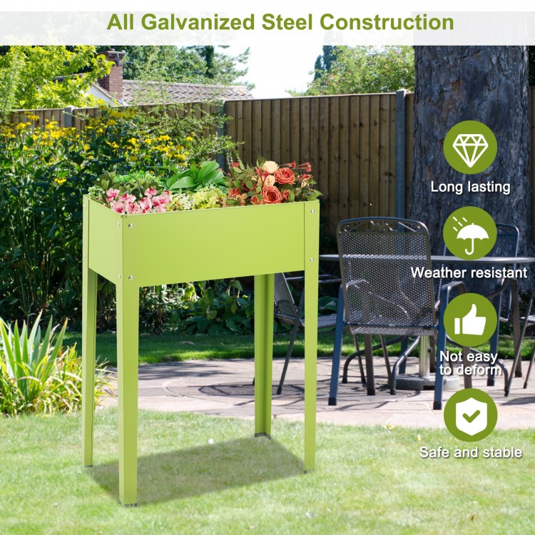 Green elevated garden planter made of galvanized steel, 31.5" high, perfect for easy gardening in your yard.