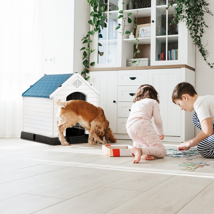 Durable plastic waterproof pet house with a ventilated design, providing a cozy shelter for dogs indoors or outdoors.