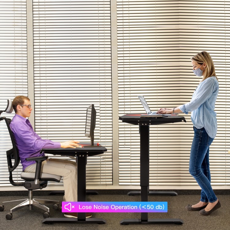 Electric standing gaming desk with height adjustable splice board, featuring a noiseless motor for quiet operation.