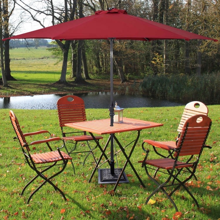 Heavy-duty 30 lbs square umbrella base stand with bronze finish, designed for outdoor umbrellas and easy assembly.
