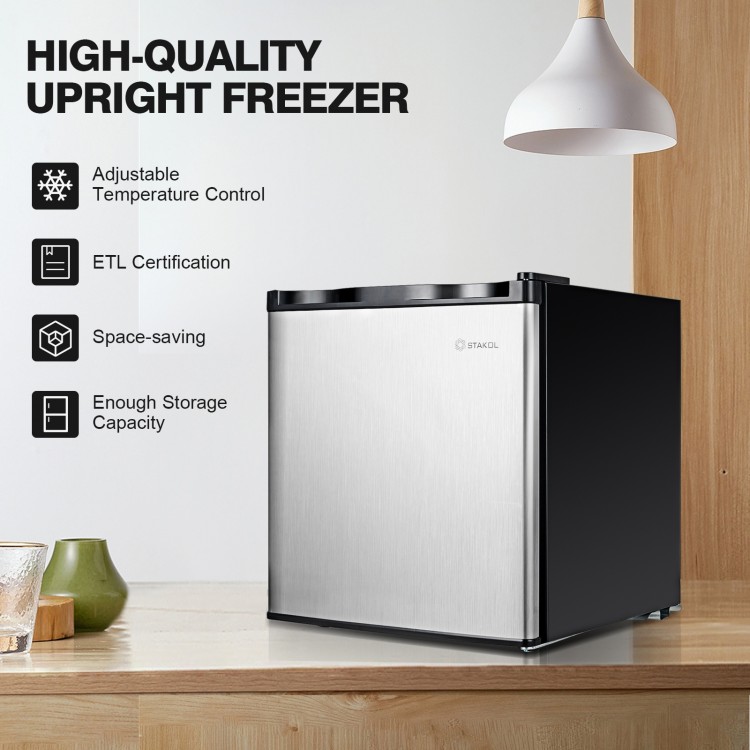 Compact 1.1 cu.ft. upright freezer with stainless door, adjustable temperature control, and space-saving design for.