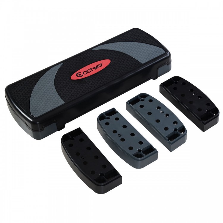 Adjustable 32-inch fitness aerobic step with risers, featuring a non-slip surface for versatile indoor and outdoor.